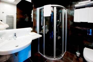 Фото номера Двухместный номер с 2 отдельными кроватями Отель Hotel Symfonia Osjaków г. Осьякув 3